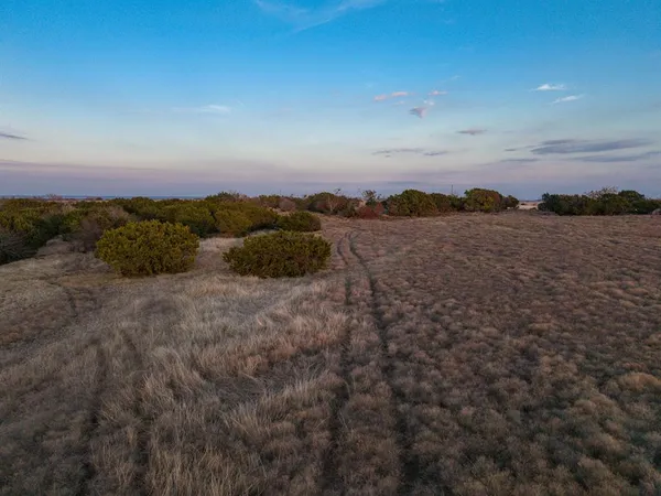 a view of a pathway with a lake view