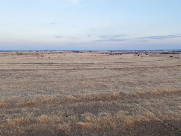 a view of a beach with an ocean view