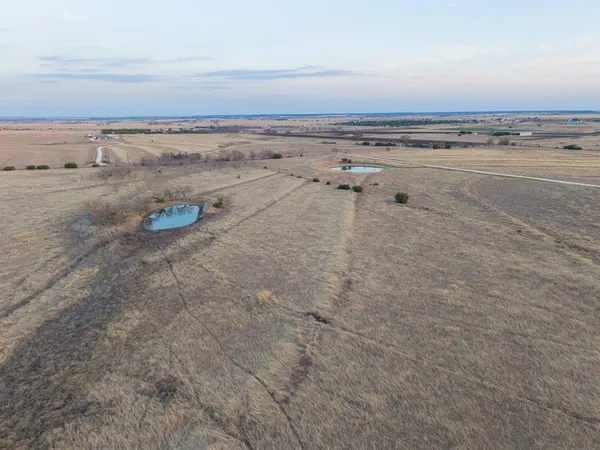 a view of a swimming pool with an ocean view