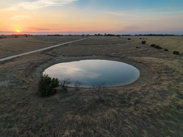 a view of a lake with outdoor space