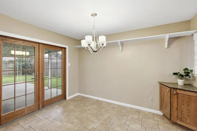 a view of an empty room with window