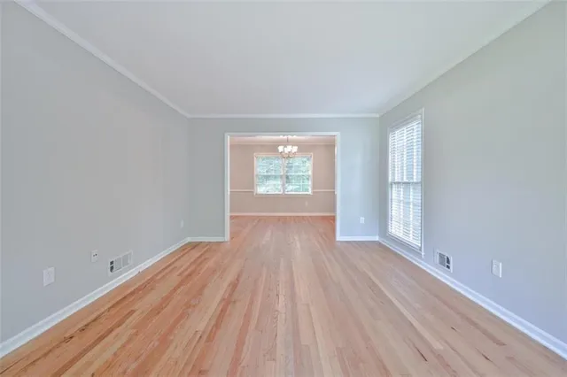 a bathroom with a shower sink and mirror