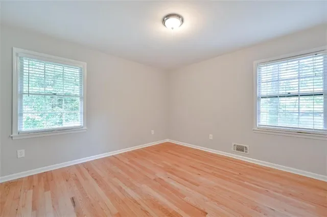 an empty room with windows