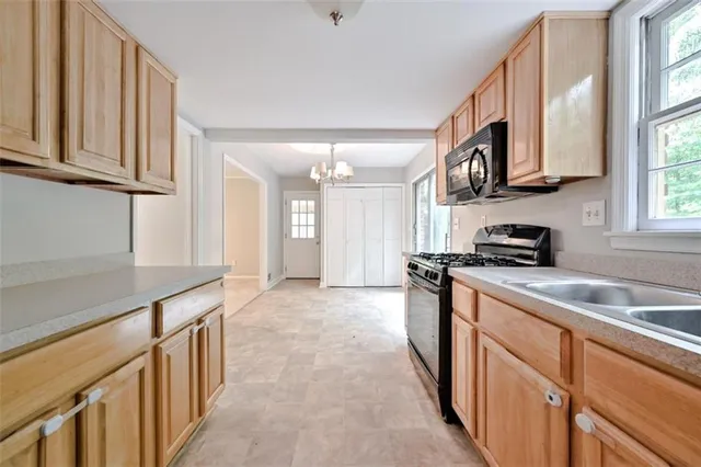 a bathroom with a sink toilet and vanity