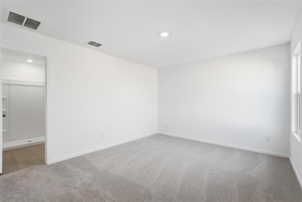 3919 Selawik Street Sherman, TX 75090 - Photo 11 of 21 an empty room with a empty space