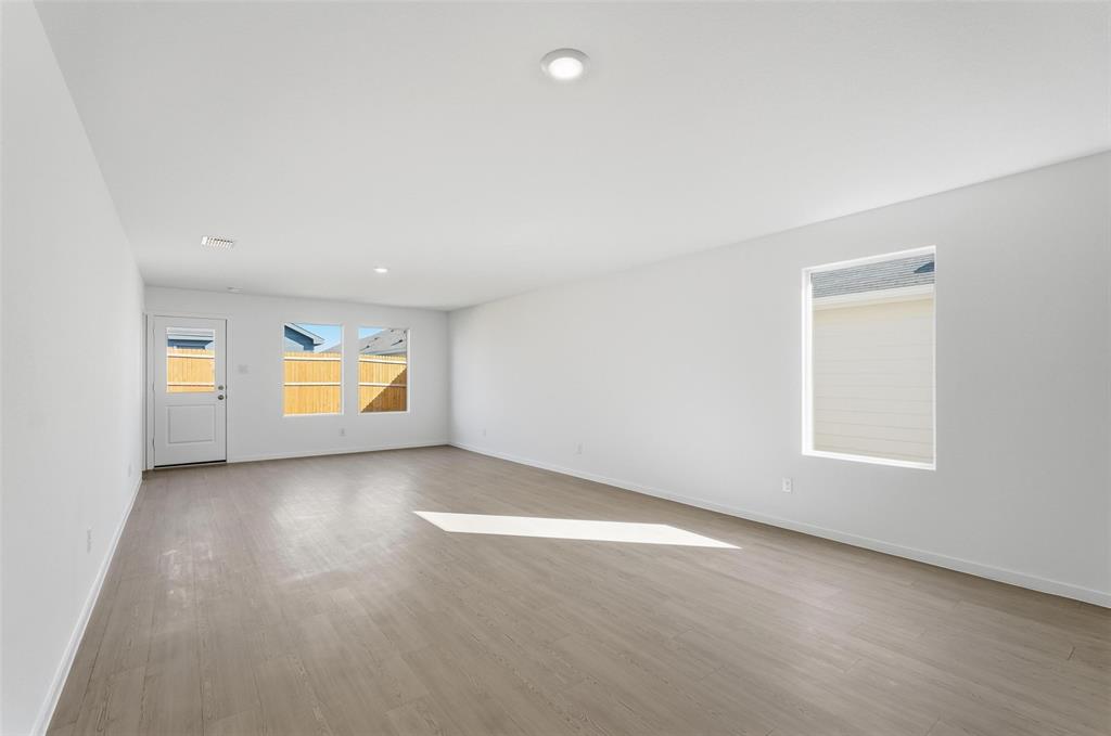 3919 Selawik Street Sherman, TX 75090 - Photo 13 of 21 an empty room with windows