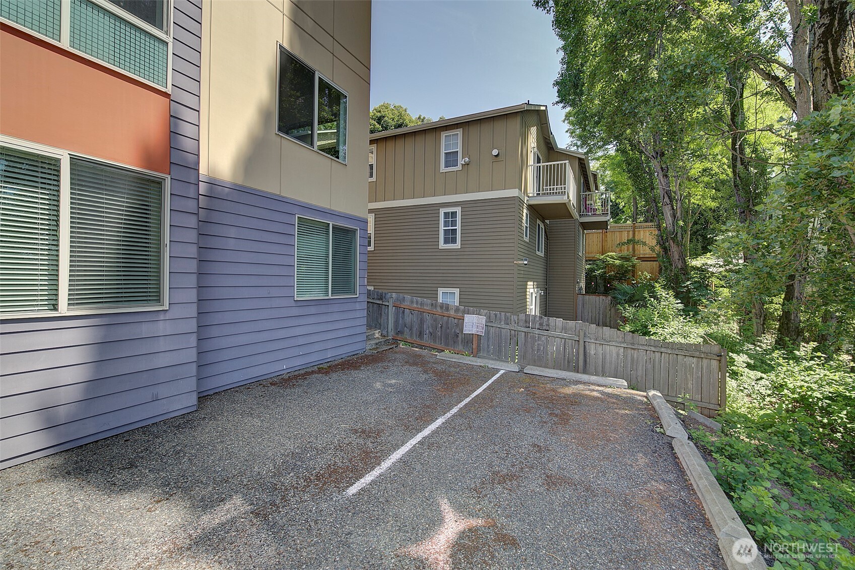 1617 South Weller Street Seattle, WA 98144 - Photo 18 of 19 a view of a house with a yard and large tree