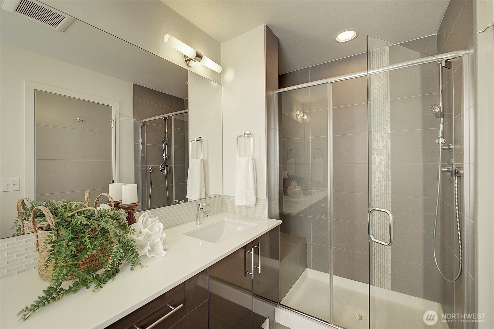 1617 South Weller Street Seattle, WA 98144 - Photo 9 of 19 a bathroom with a shower and a sink