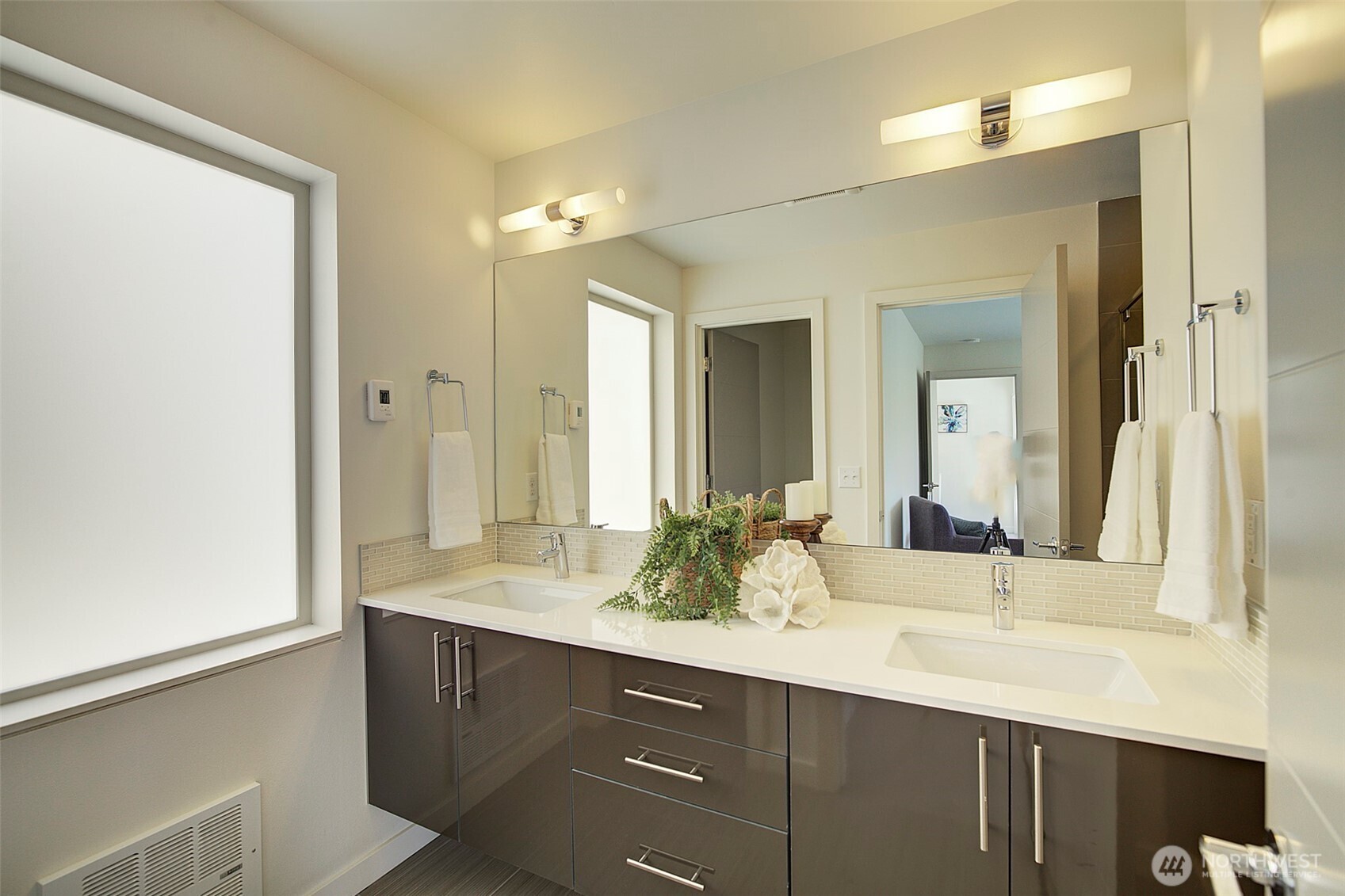 1617 South Weller Street Seattle, WA 98144 - Photo 10 of 19 a bathroom with a sink and a mirror
