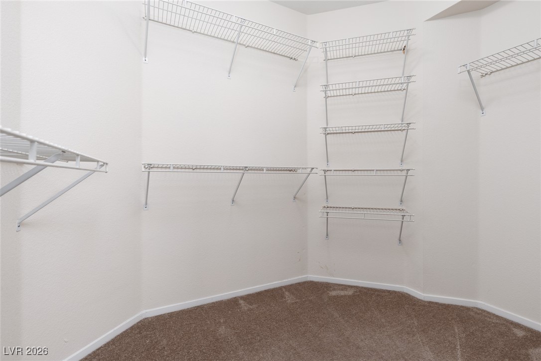 1828 Jack Rabbit Way Las Vegas, NV 89128 - Photo 29 of 39 Closet off primary bathroom