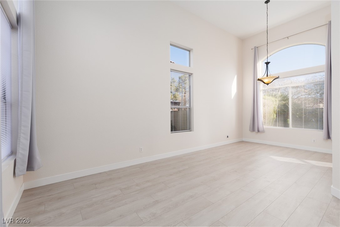 1828 Jack Rabbit Way Las Vegas, NV 89128 - Photo 7 of 39 Looking to the formal dining room from living rooim