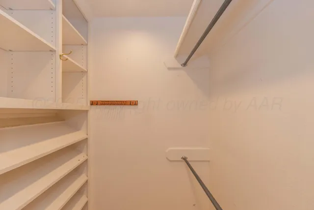 a view of small space with racks on the wall