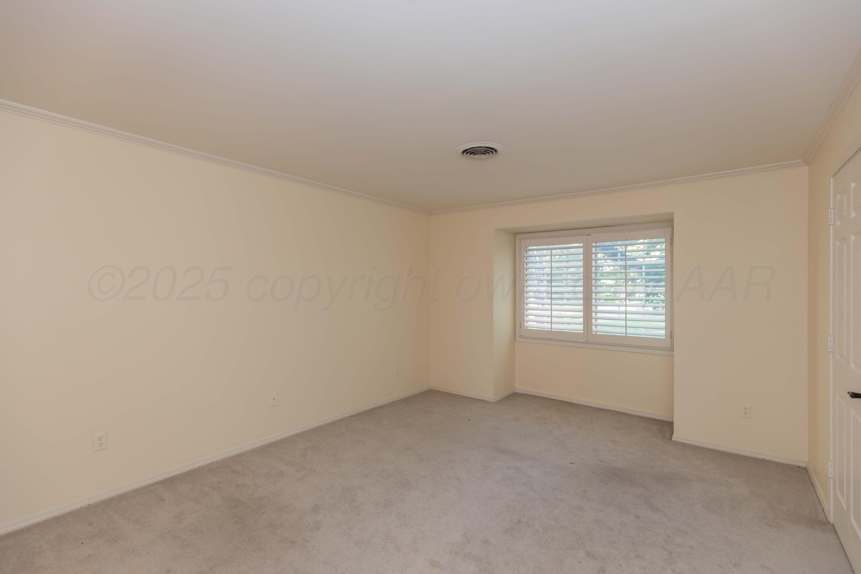 1615 South Bryan Street, Unit 11 Amarillo, TX 79102 - Photo 27 of 41 BEDROOM 2 VIEW 1