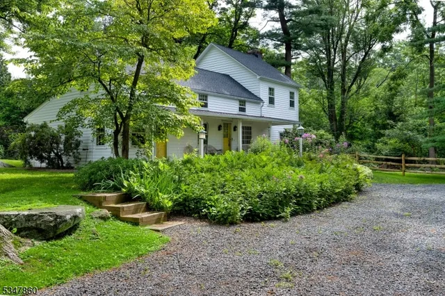 a house view with a garden space
