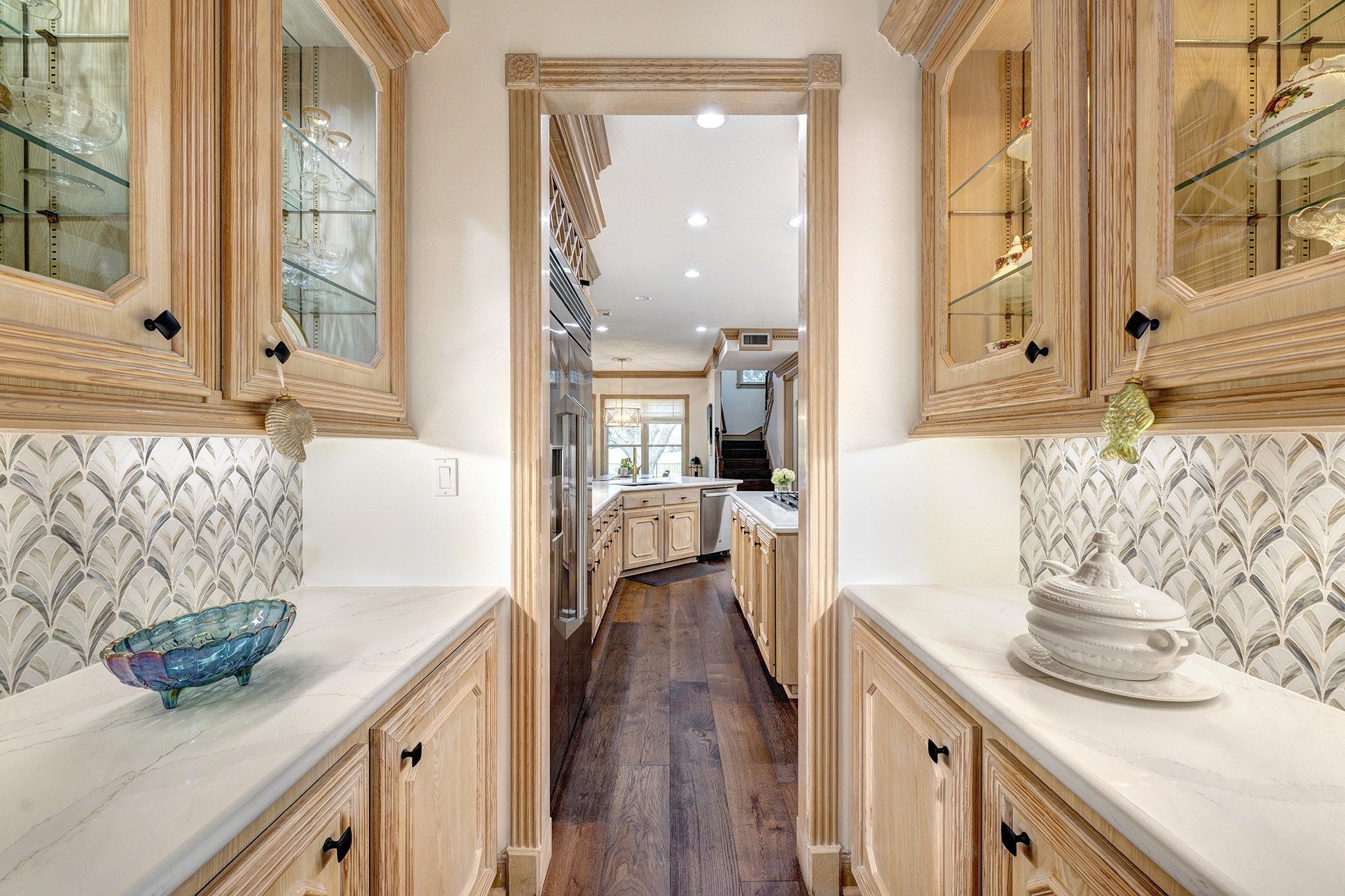 14310 Spring Maple Lane Houston, TX 77062 - Photo 13 of 40 a view of a kitchen area with furniture and wooden floor