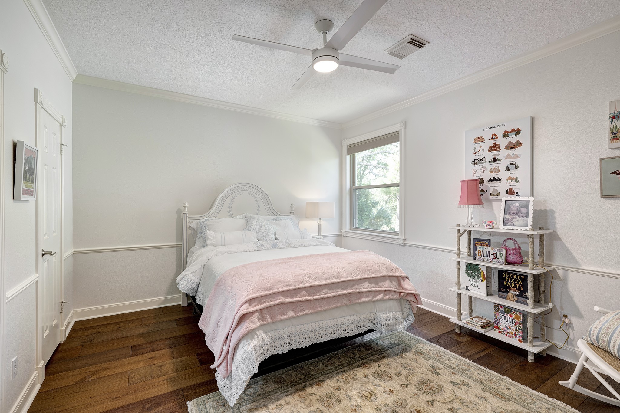 14310 Spring Maple Lane Houston, TX 77062 - Photo 23 of 40 a bedroom with a bed and a window