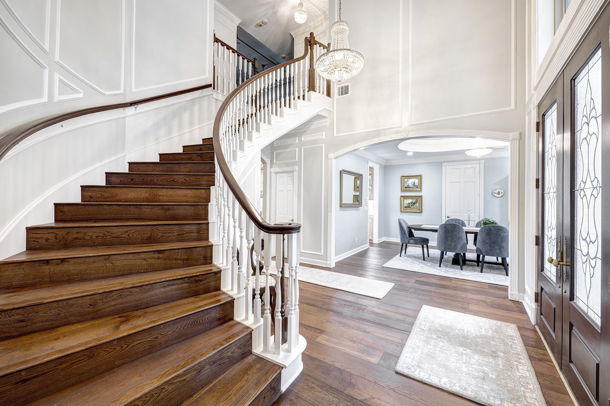 14310 Spring Maple Lane Houston, TX 77062 - Photo 3 of 40 a view of entryway and hall with wooden floor