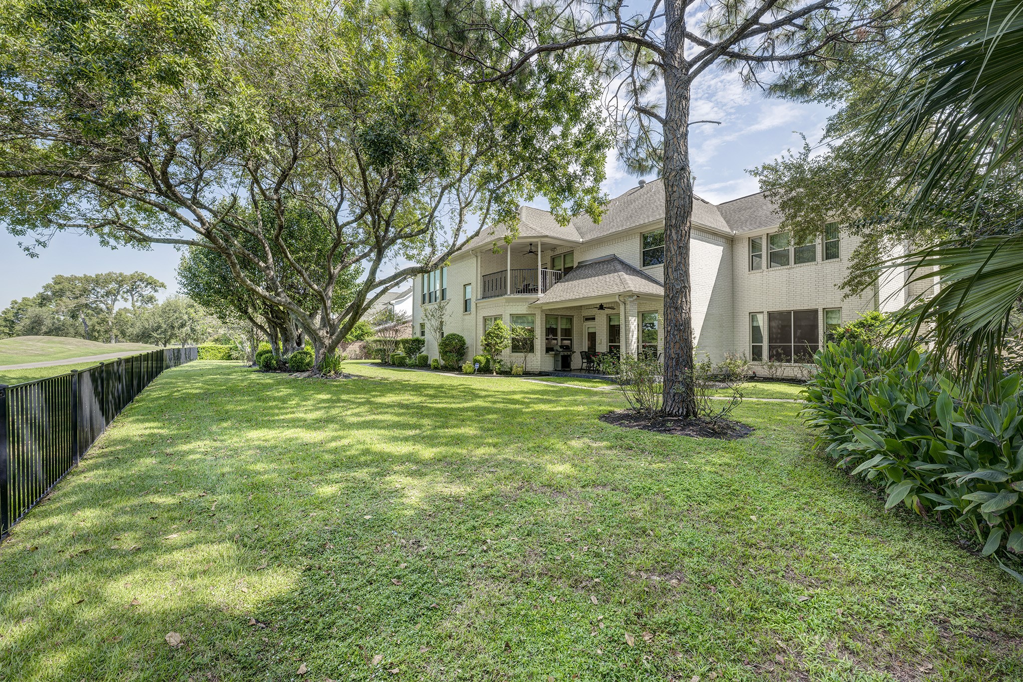 14310 Spring Maple Lane Houston, TX 77062 - Photo 34 of 40 a view of house with yard