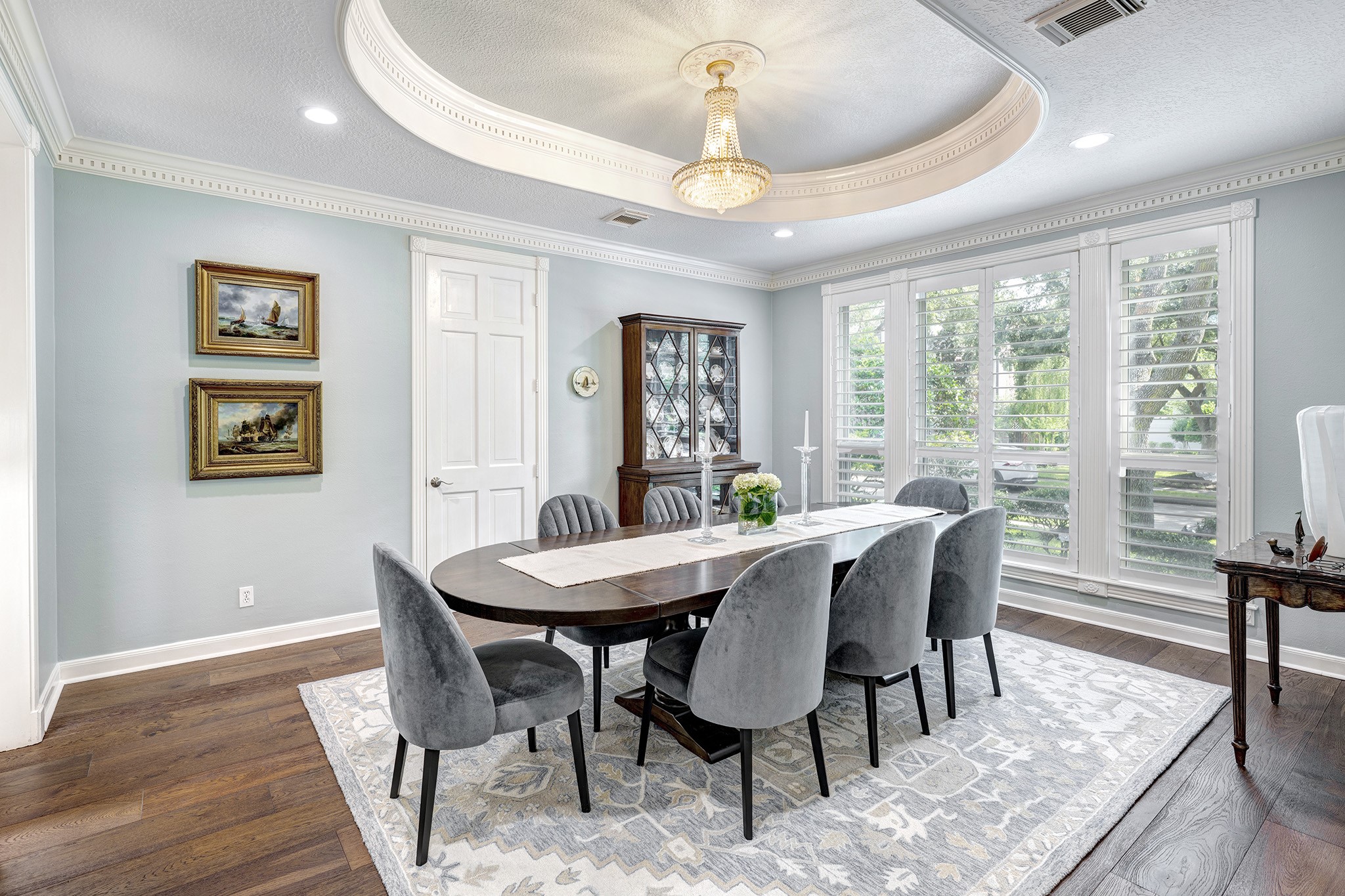 14310 Spring Maple Lane Houston, TX 77062 - Photo 4 of 40 a view of a dining room with furniture window and wooden floor