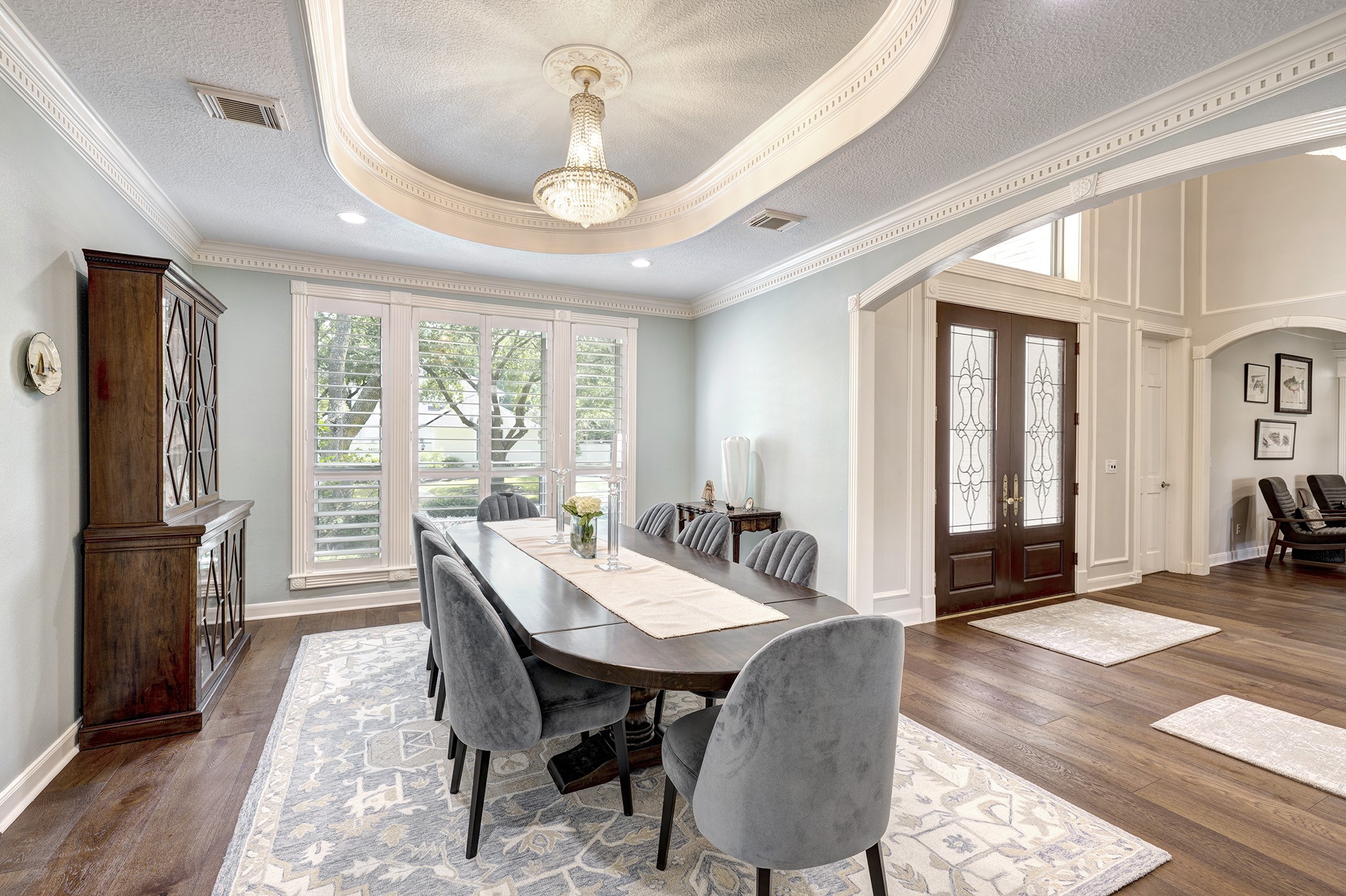 14310 Spring Maple Lane Houston, TX 77062 - Photo 5 of 40 a view of a dining room with furniture window and wooden floor