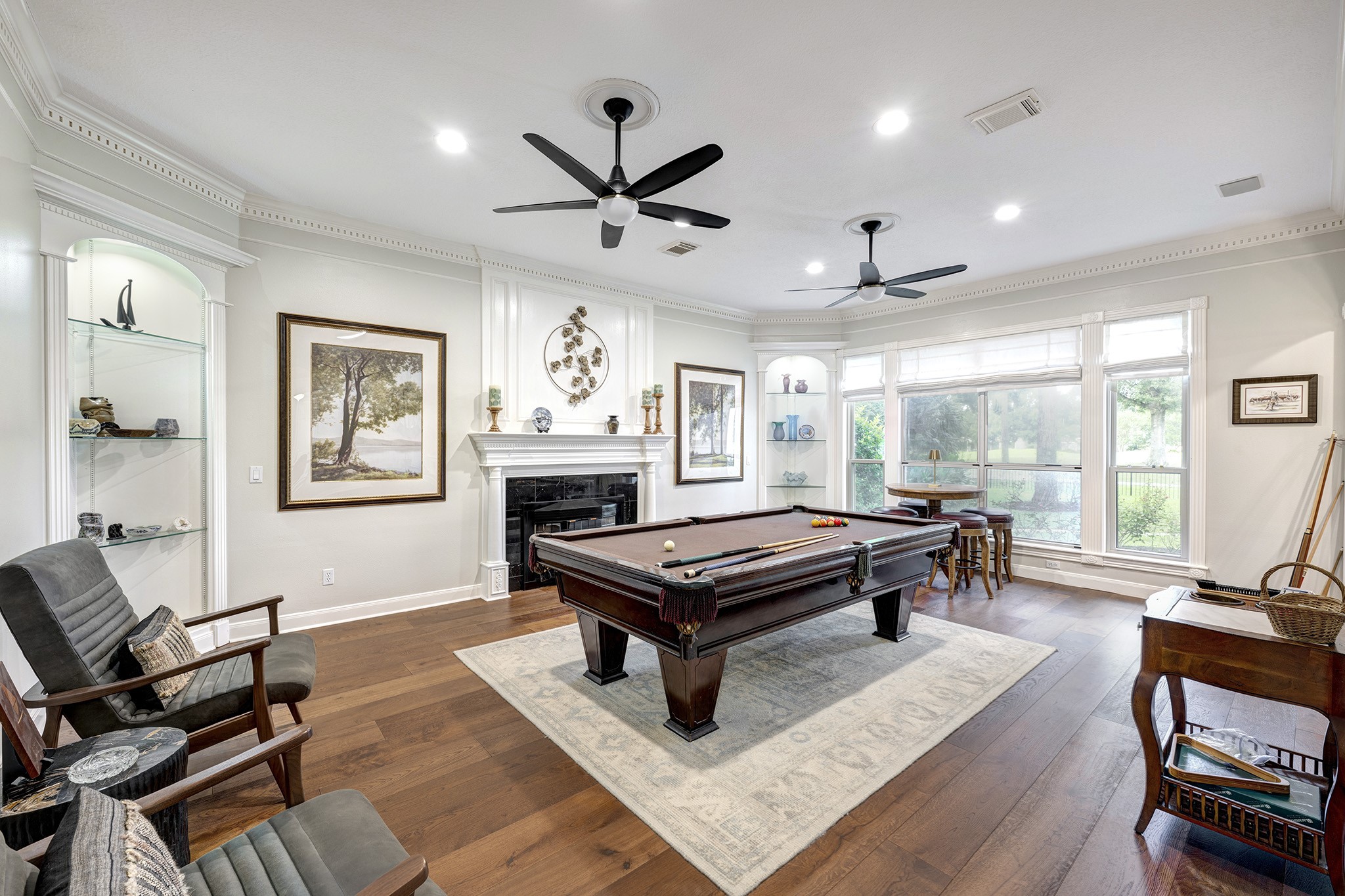 14310 Spring Maple Lane Houston, TX 77062 - Photo 6 of 40 a living room with furniture a pool table and a large window