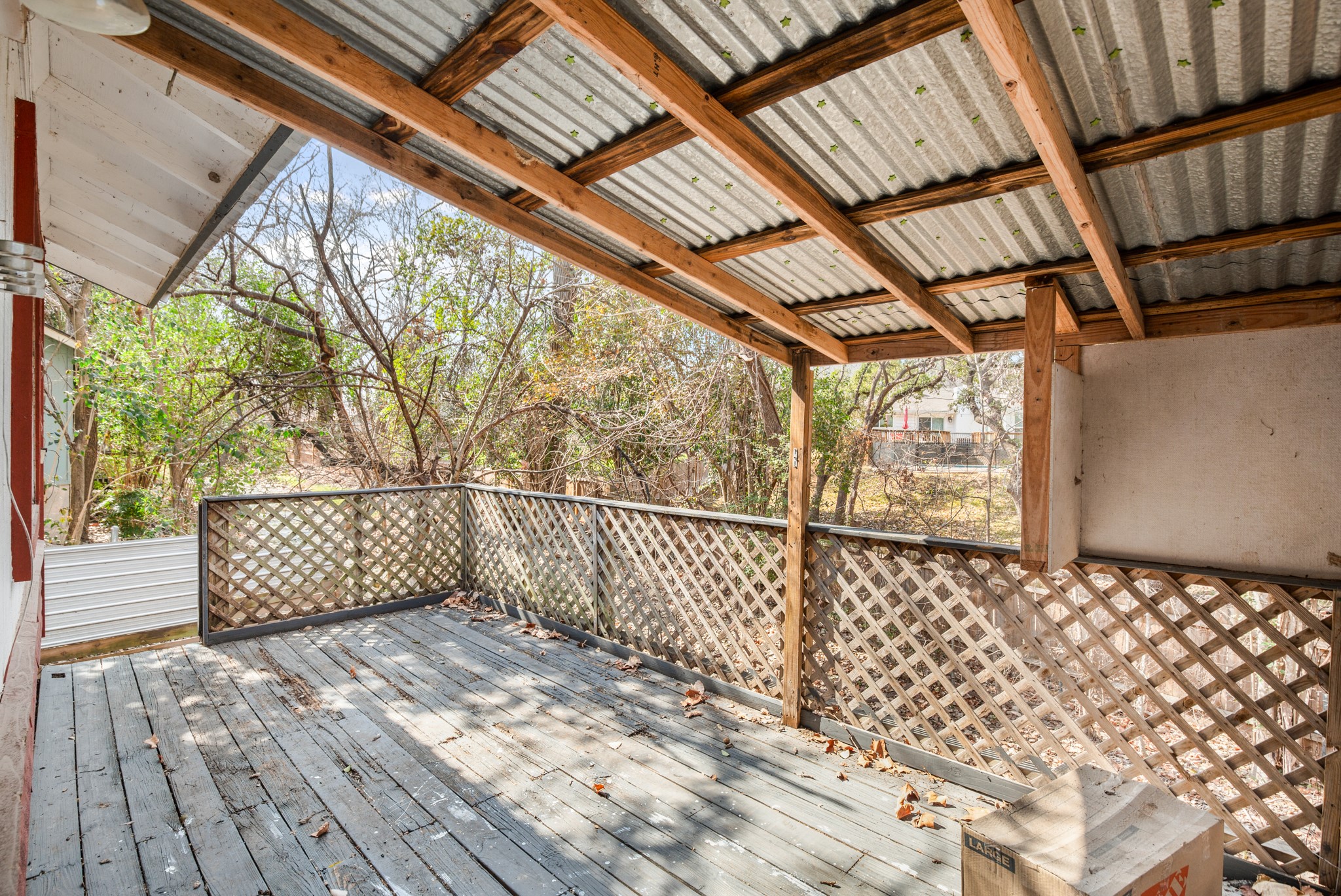 5402 Brompton Circle Austin, TX 78745 - Photo 28 of 30 The shared rear deck provides a comfortable space for outdoor lounging or dining.