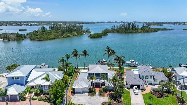 a view of an entryway with wooden floor and windows
