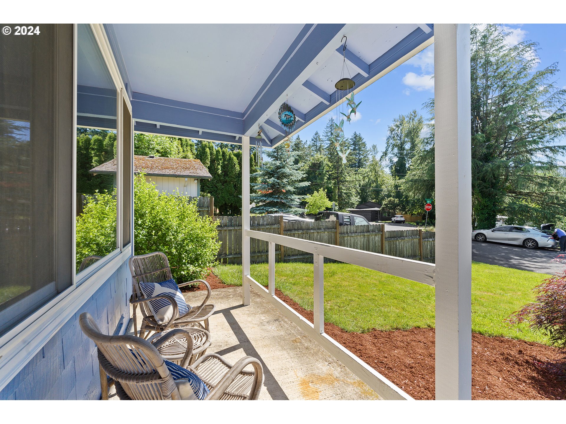 7946 Southeast 103rd Avenue Portland, OR 97266 - Photo 7 of 32 a view of a swimming pool with a porch