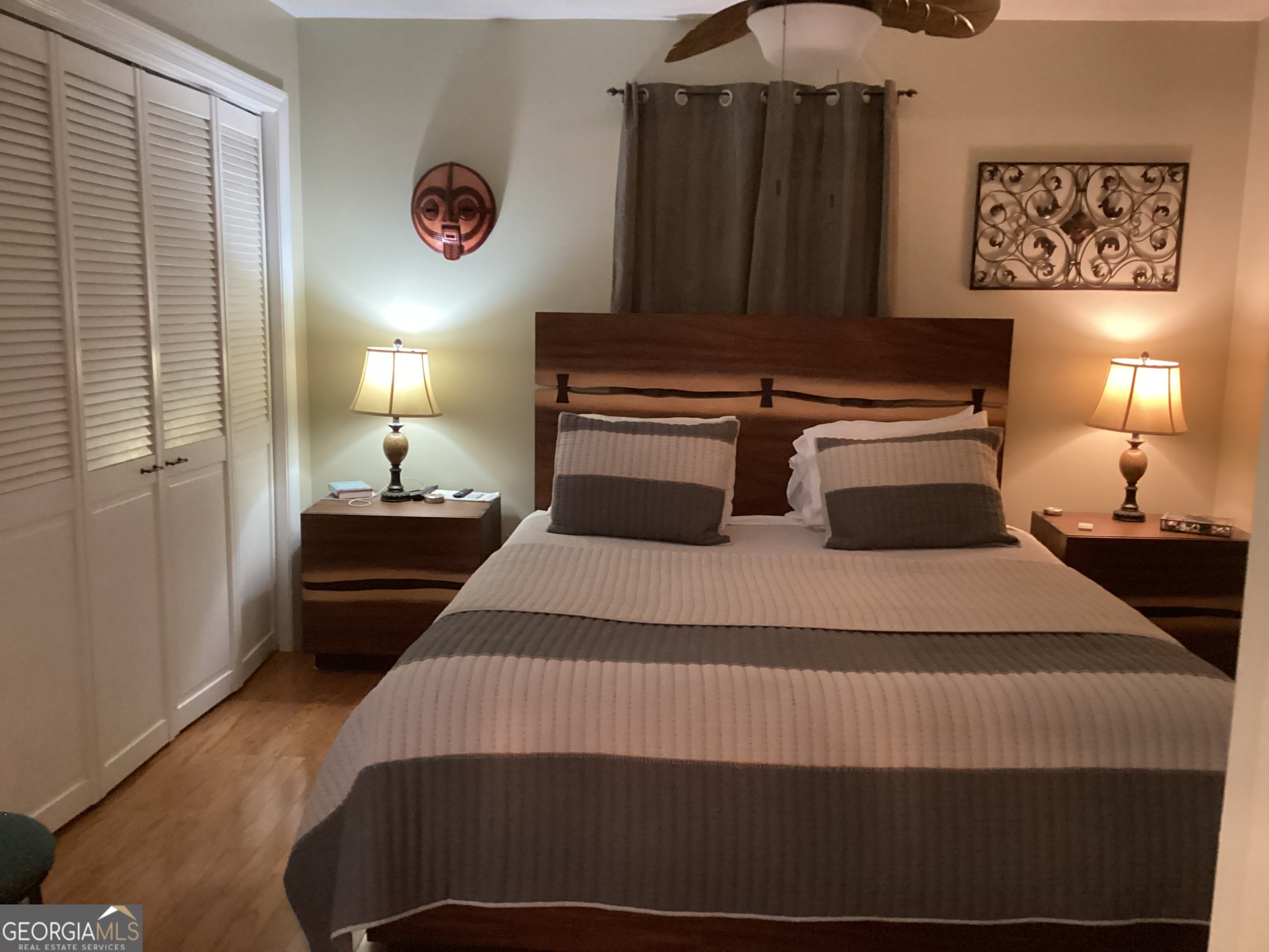 2779 Bob Cox Road Marietta, GA 30064 - Photo 30 of 48 a bedroom with a bed and wooden floor