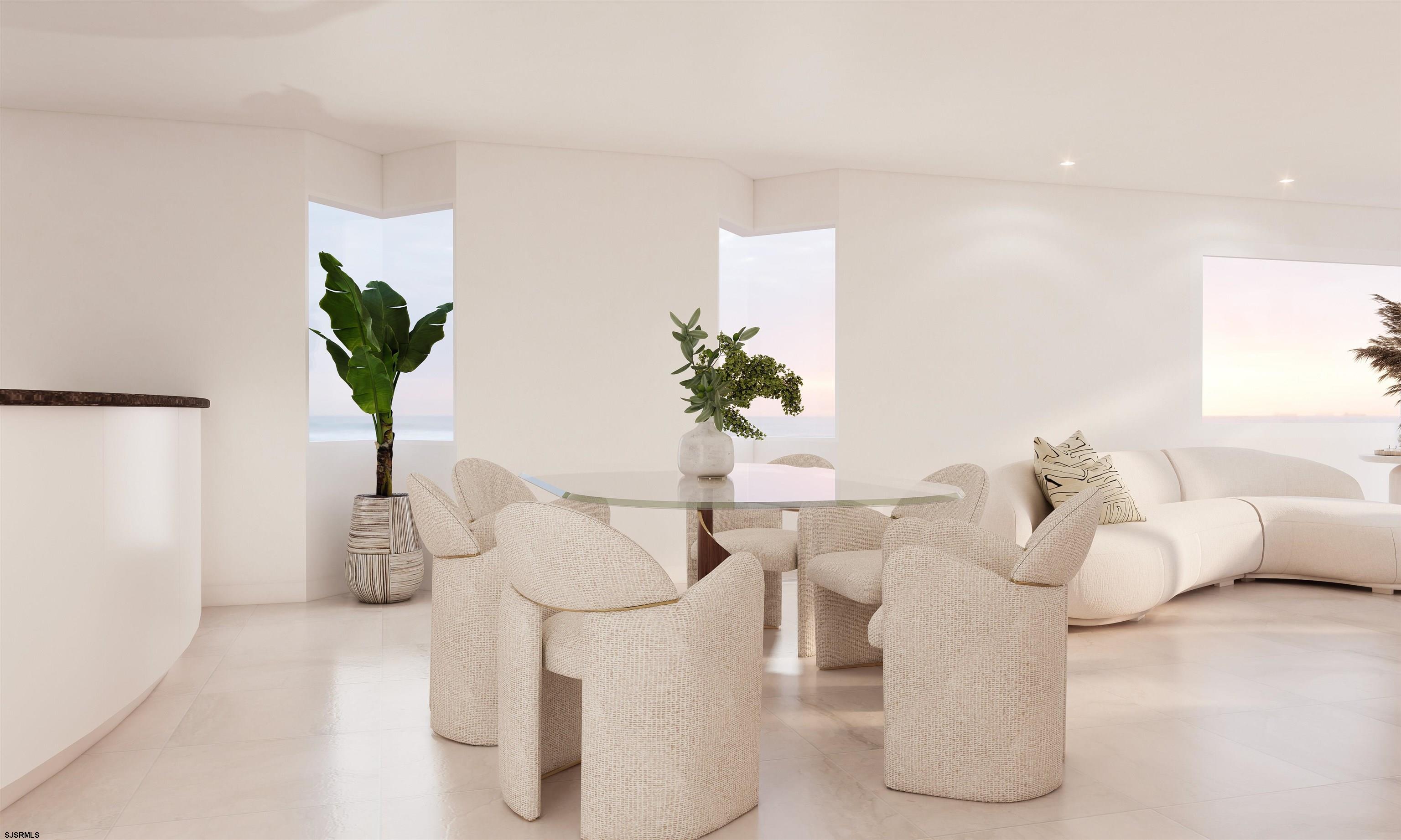 9 Point Drive Longport, NJ 08403 - Photo 16 of 38 a living room with furniture and a potted plant