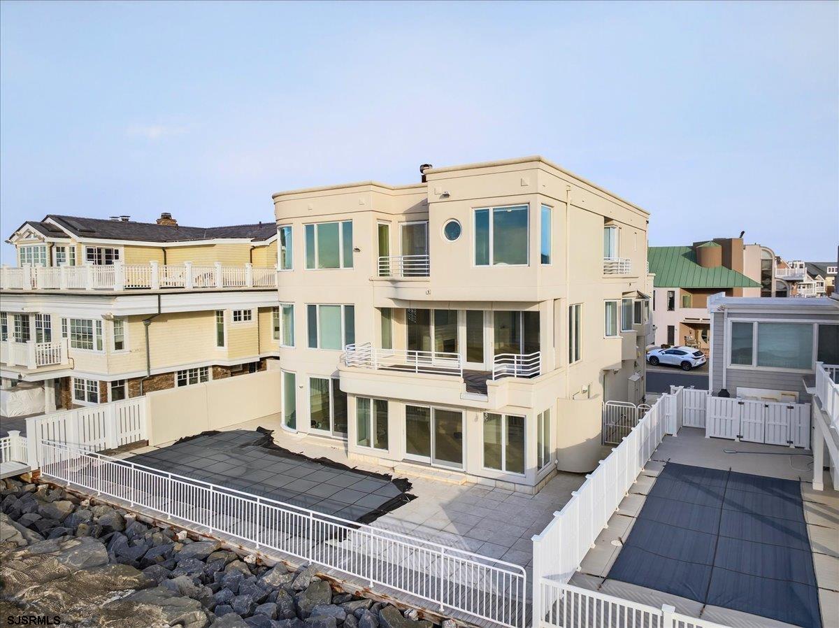 9 Point Drive Longport, NJ 08403 - Photo 20 of 38 a view of a white building among the row of buildings