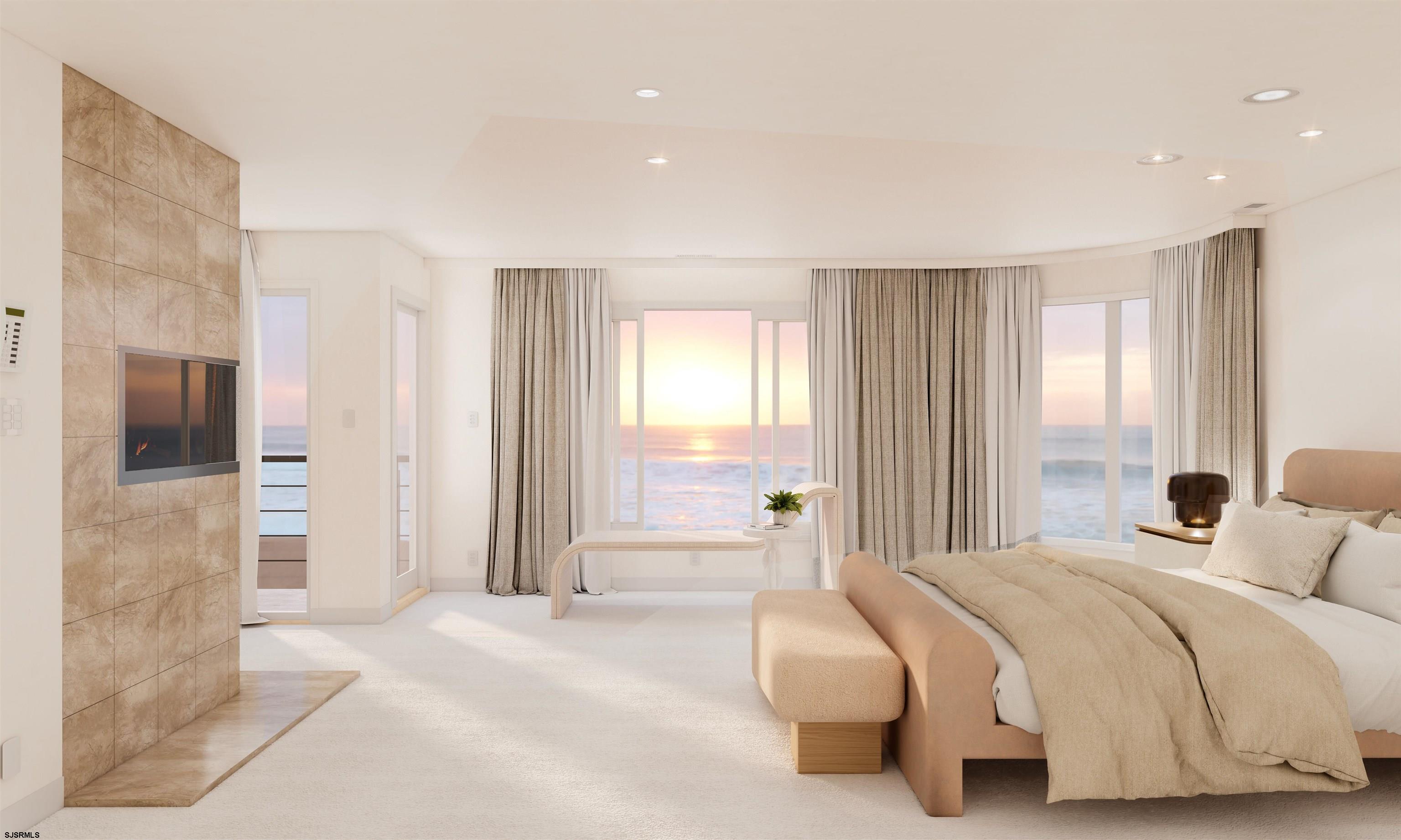 9 Point Drive Longport, NJ 08403 - Photo 26 of 38 a spacious bedroom with a bed and a couch