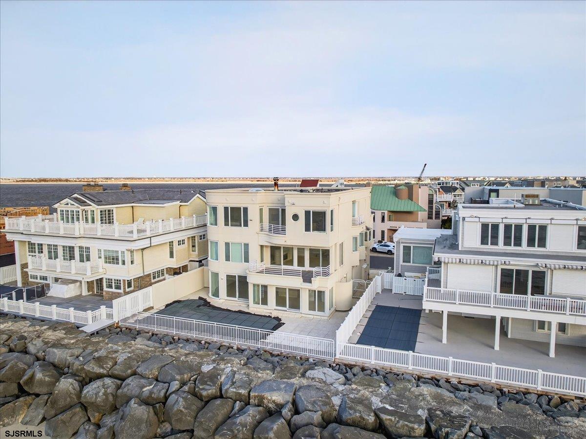 9 Point Drive Longport, NJ 08403 - Photo 33 of 38 a view of a large building with a bench