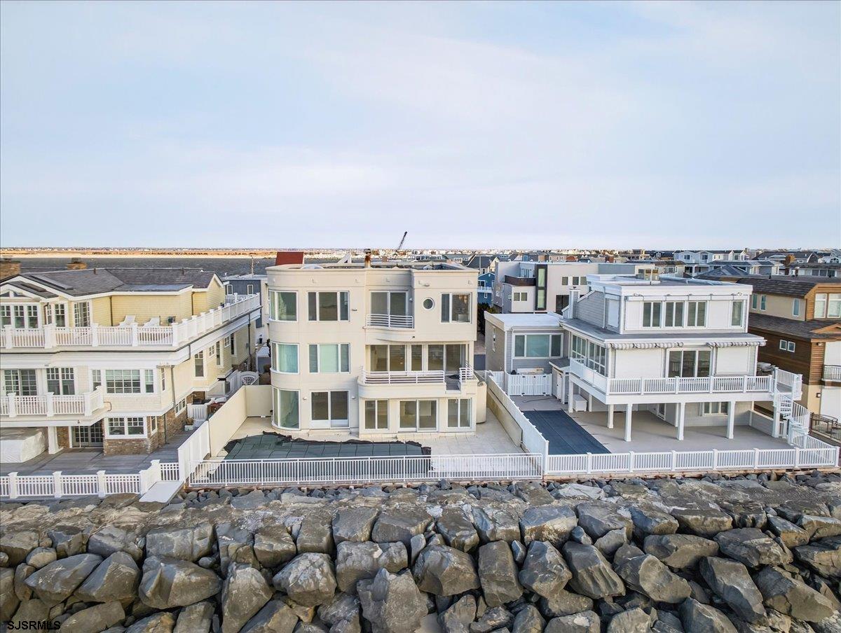 9 Point Drive Longport, NJ 08403 - Photo 34 of 38 a view of a large building with a bench