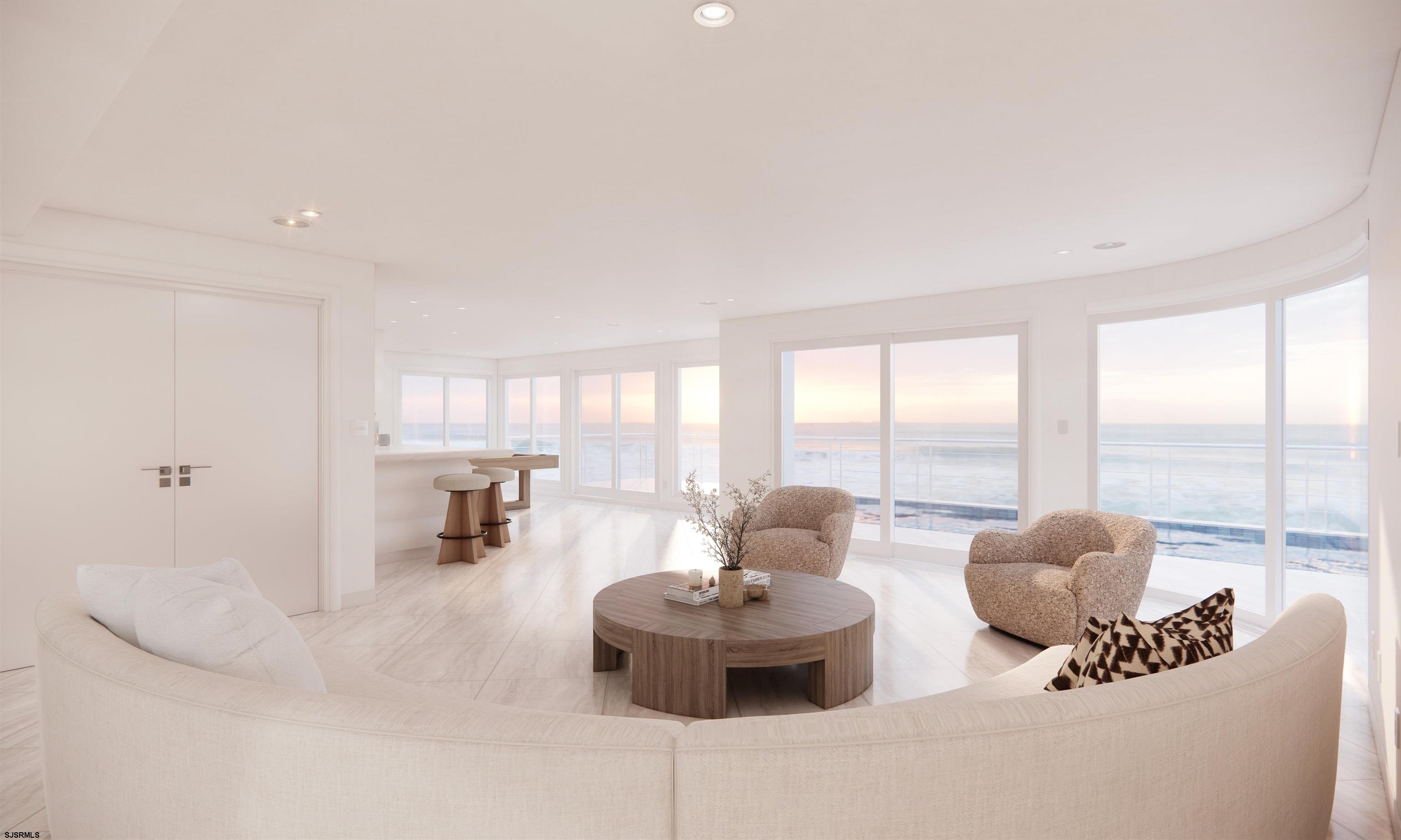 9 Point Drive Longport, NJ 08403 - Photo 6 of 38 a living room with furniture and a floor to ceiling window