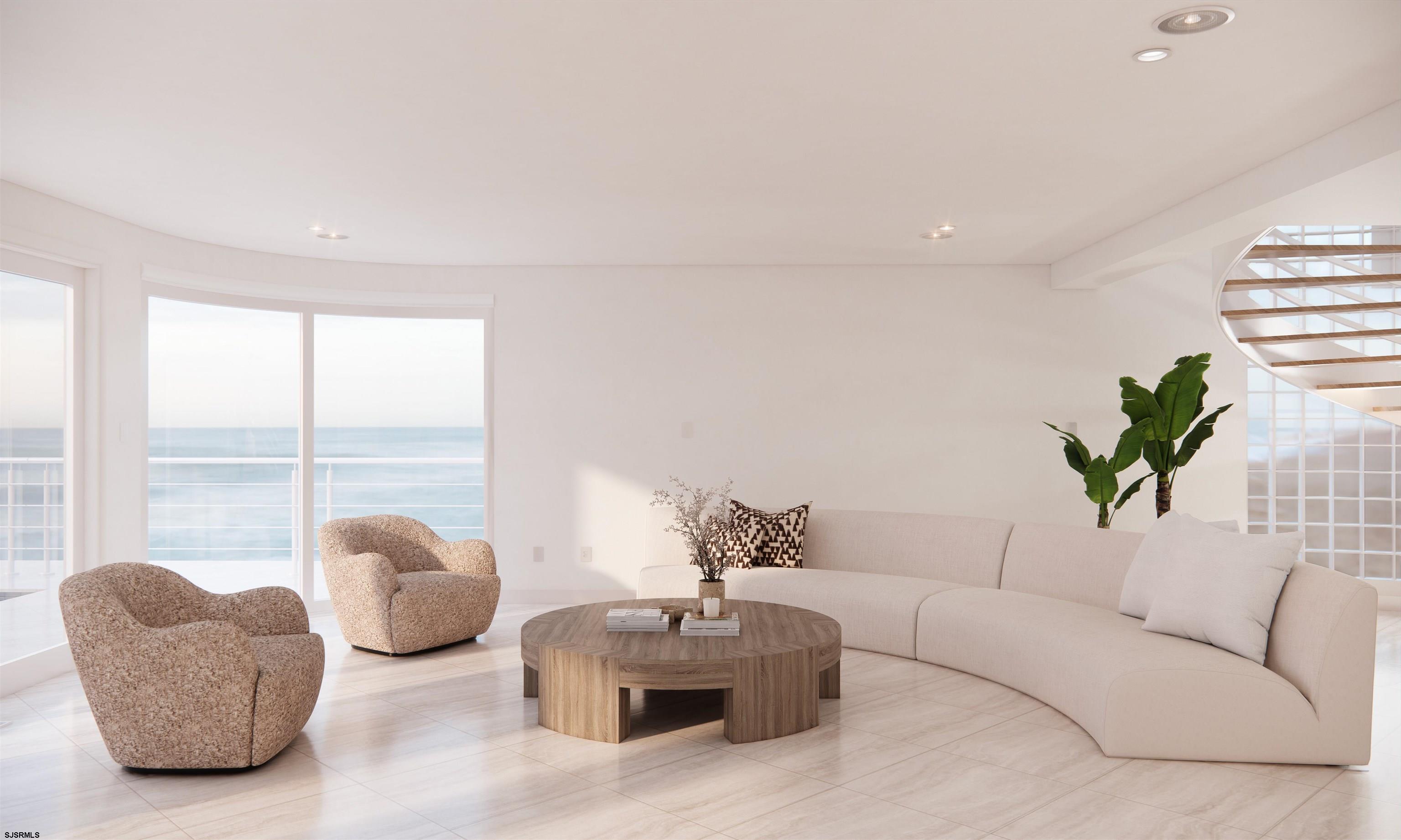 9 Point Drive Longport, NJ 08403 - Photo 8 of 38 a living room with furniture and a large window