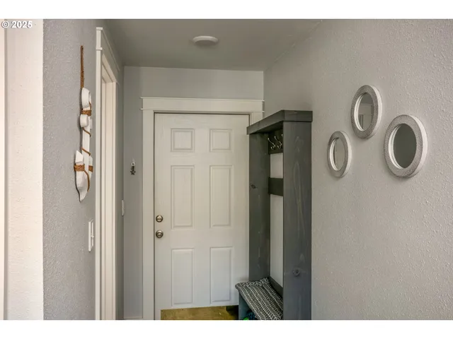 a view of a refrigerator in a kitchen