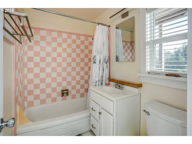 a bathroom with a sink and a bathtub