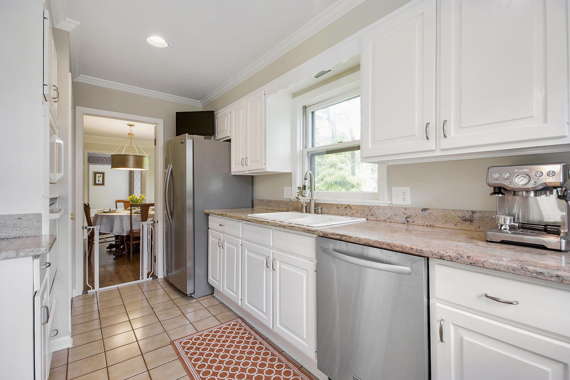 17 Old Oak Road Darien, CT 06820 - Photo 11 of 28 a kitchen with granite countertop a refrigerator and a sink