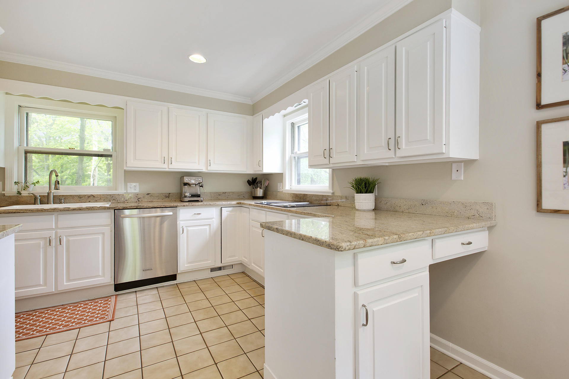 17 Old Oak Road Darien, CT 06820 - Photo 13 of 28 a kitchen with a sink window and cabinets