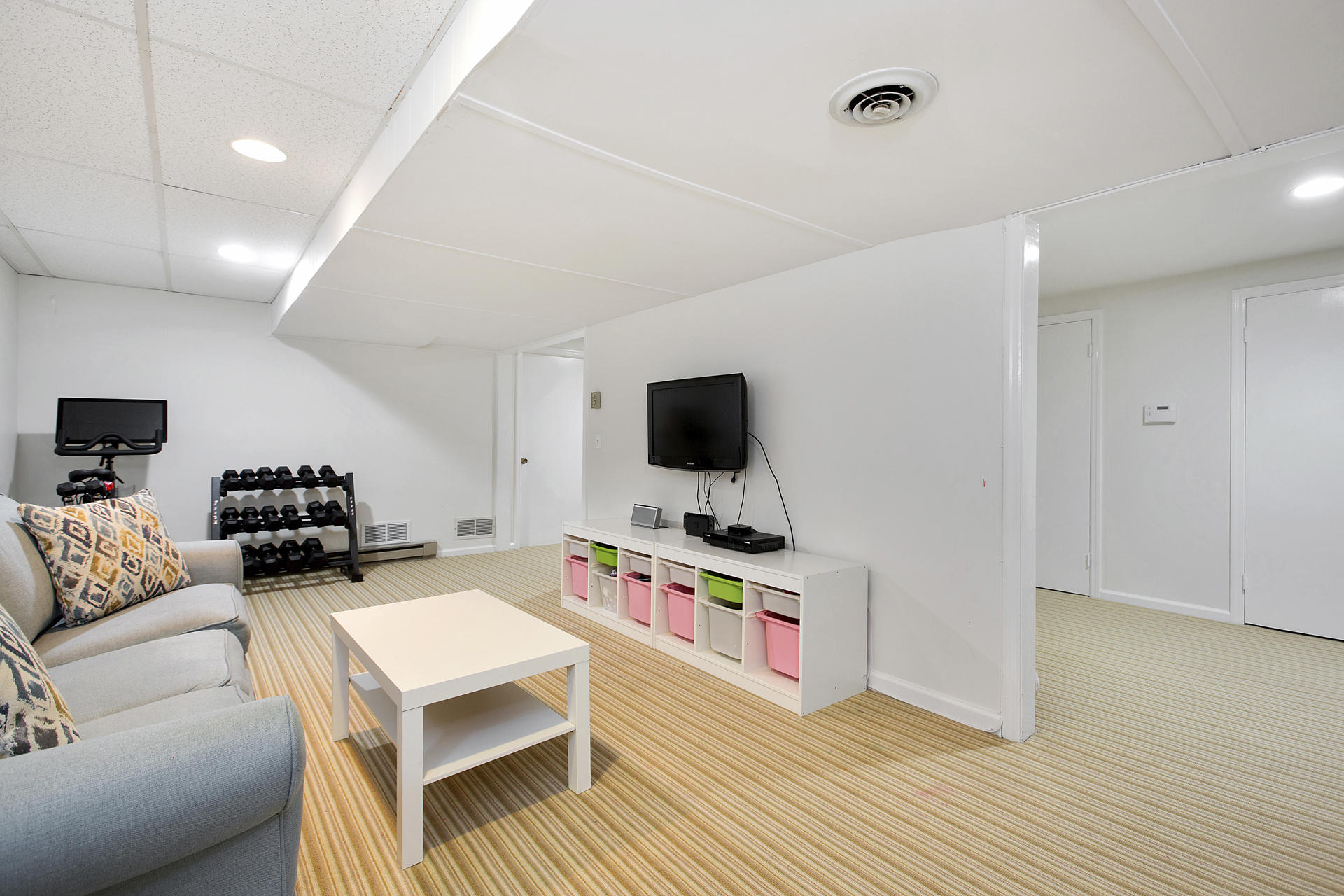 17 Old Oak Road Darien, CT 06820 - Photo 26 of 28 a living room with furniture and a flat screen tv