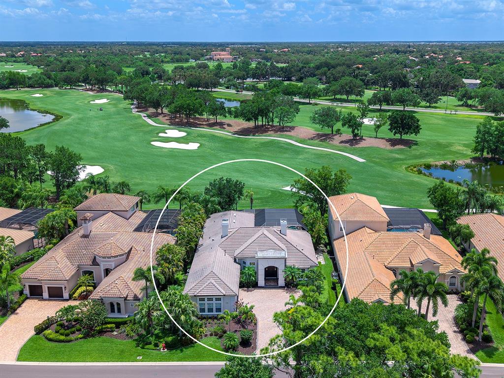 7431 Greystone Street Lakewood Ranch, FL 34202 - Photo 1 of 85 an aerial view of a house with outdoor space and street view