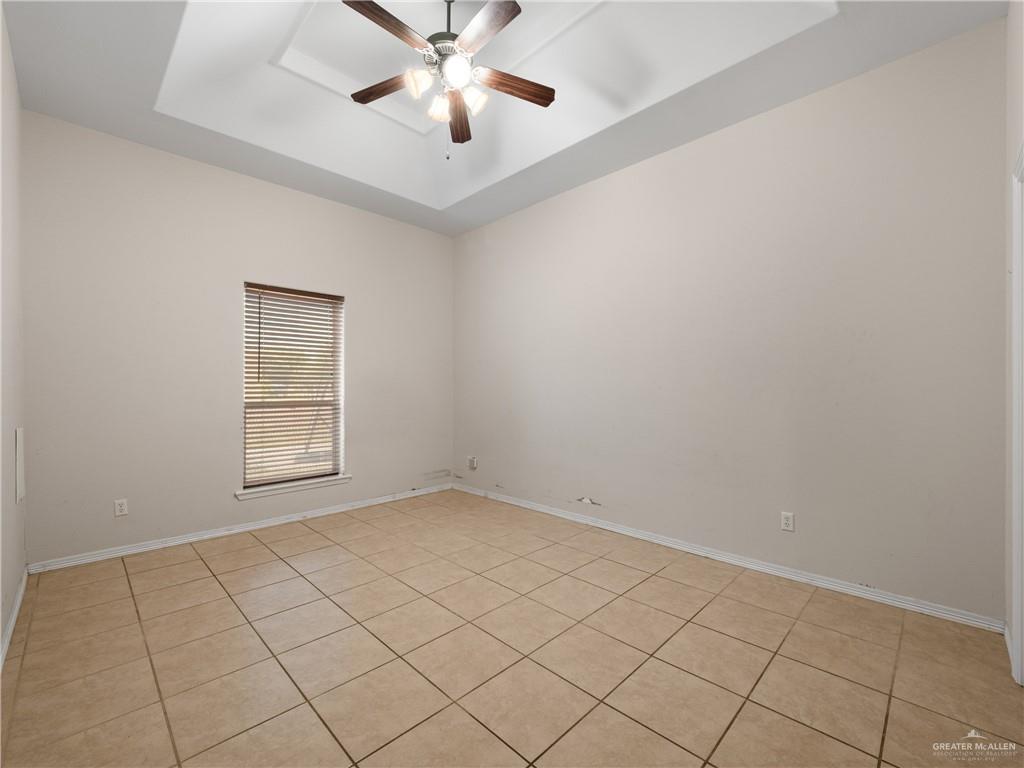 4414 Water's Edge Harlingen, TX 78552 - Photo 14 of 32 a view of an empty room with a window