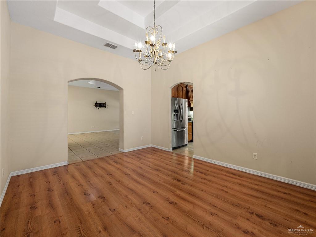 4414 Water's Edge Harlingen, TX 78552 - Photo 6 of 32 a view of a livingroom with a chandelier