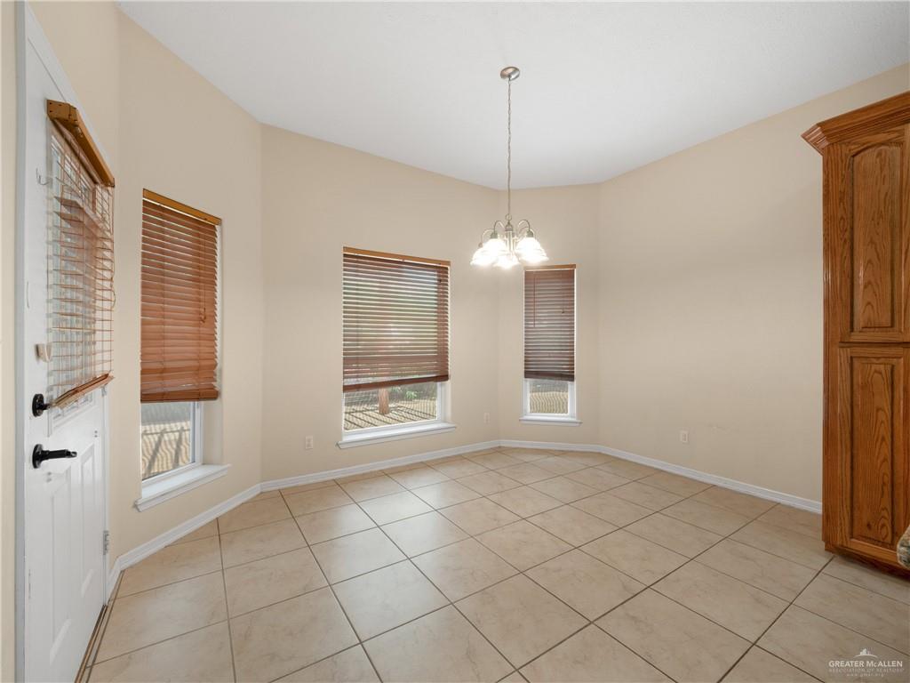 4414 Water's Edge Harlingen, TX 78552 - Photo 9 of 32 a view of an empty room with a window
