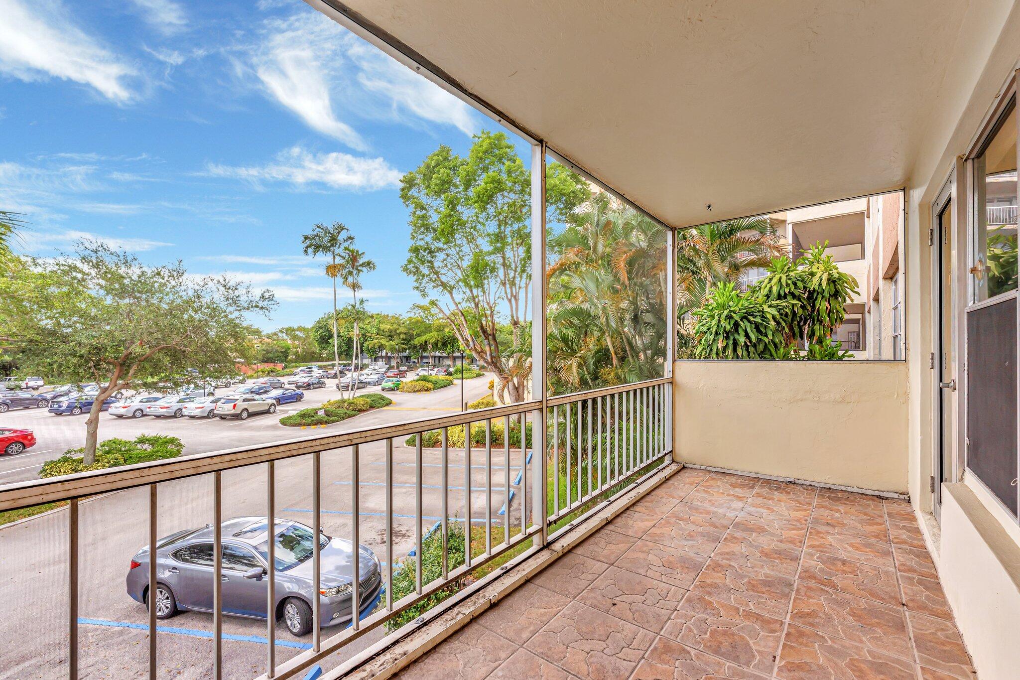 10777 West Sample Road, Unit 207 Coral Springs, FL 33065 - Photo 27 of 48 a view of balcony with furniture