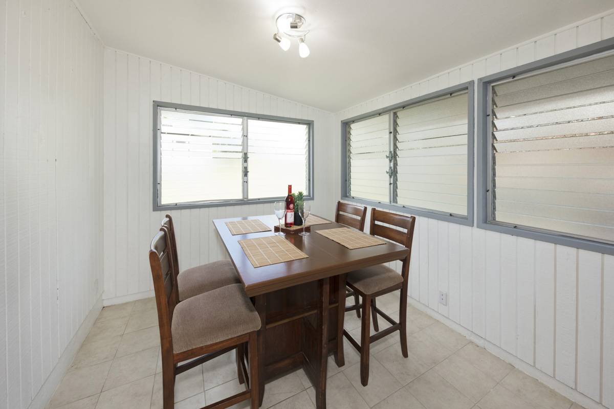 49 Iiwipolena Road Hilo, HI 96720 - Photo 17 of 30 a view of a dining room with a table and chairs