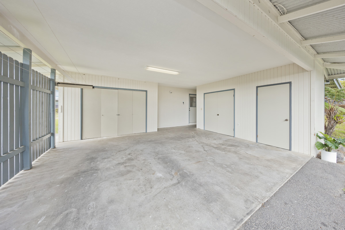 49 Iiwipolena Road Hilo, HI 96720 - Photo 22 of 30 a view of an empty room with potted plants