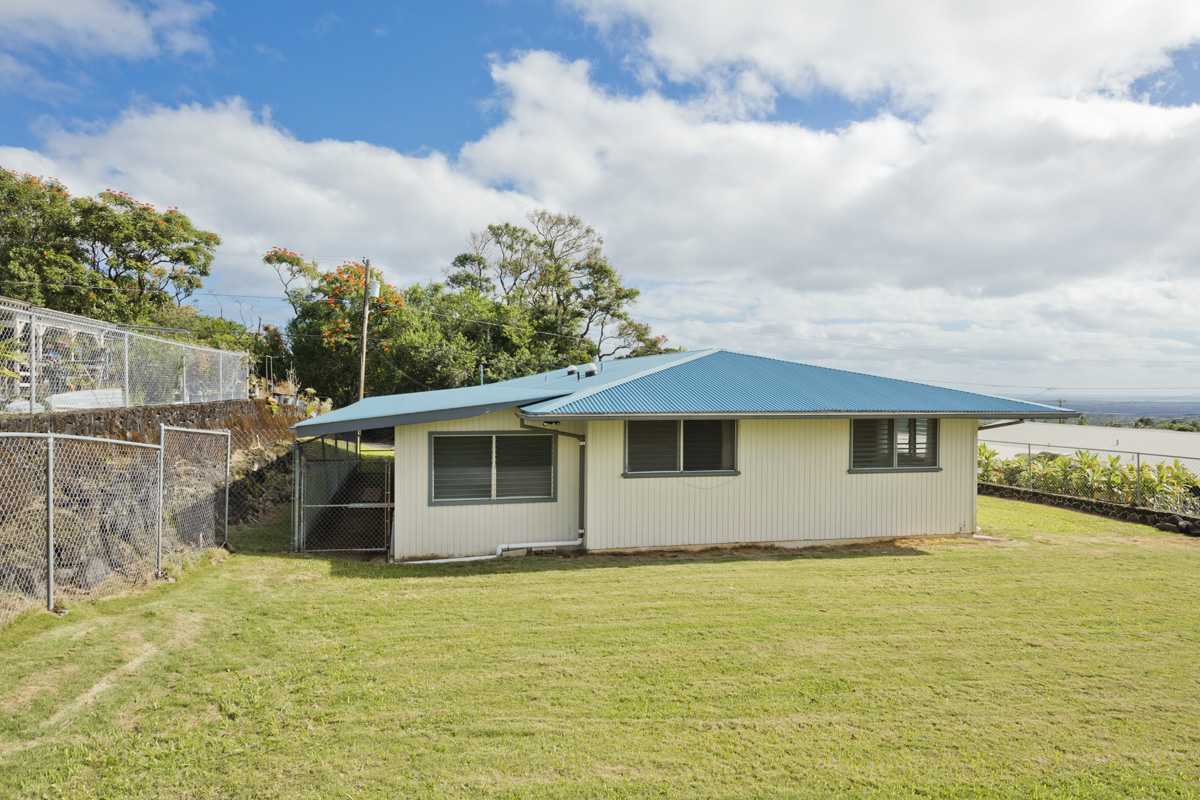 49 Iiwipolena Road Hilo, HI 96720 - Photo 26 of 30 a front view of a house with yard