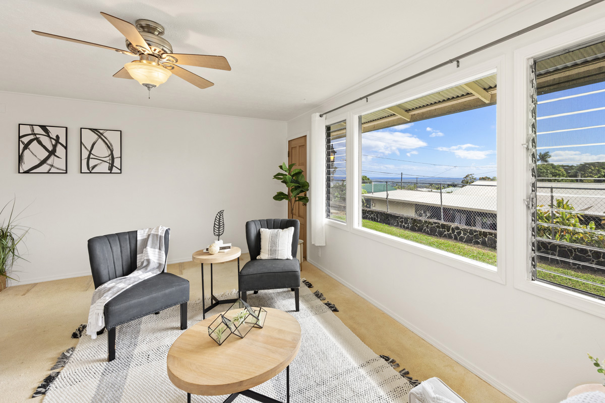 49 Iiwipolena Road Hilo, HI 96720 - Photo 4 of 30 a living room with furniture and a window